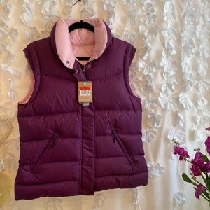 Nike women’s reversible, purple, and pink vest.